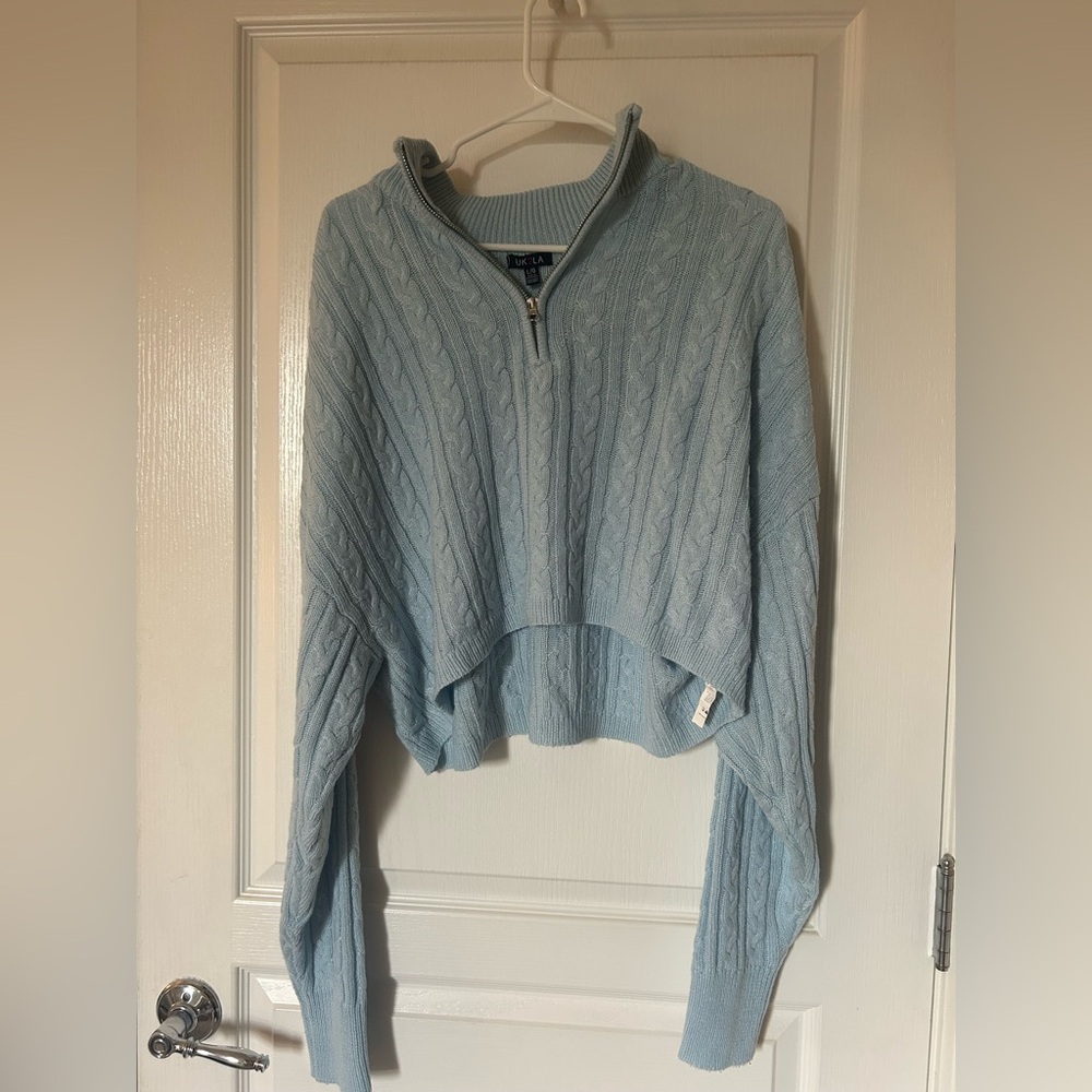 UK2LA half-zip blue sweater.